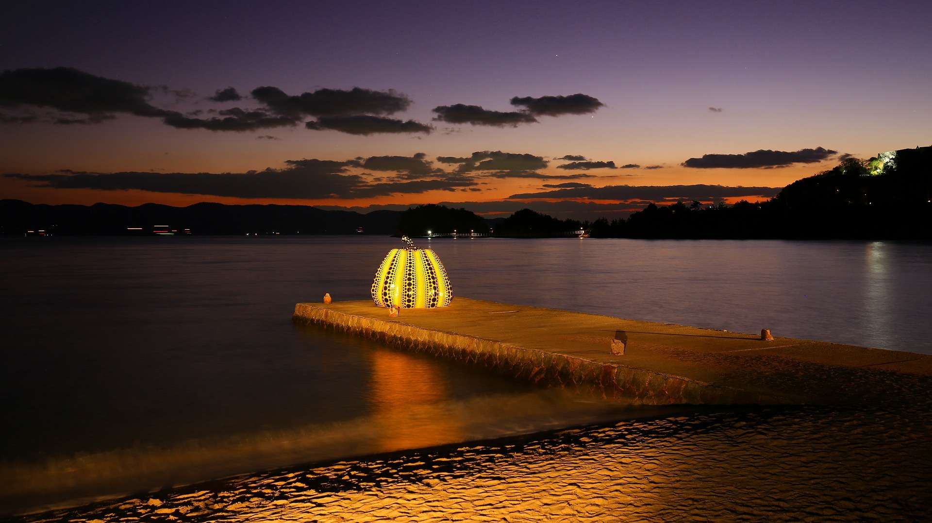 Yayoi Kusama Pumpkin on Naoshima at dusk